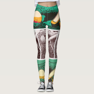 Golf boll och putter på grönt leggings