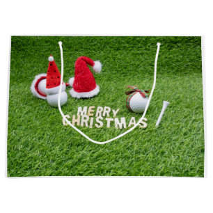 Golf boll och Santa hat för guldjulen