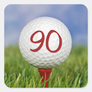 golf boll på 90:e födelsedag med röd försäkring fyrkantigt klistermärke