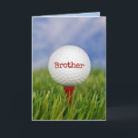 Golf Boll på Tee for Brother Kort<br><div class="desc">Stäng golf boll på rött T i grönt gräs för Brothers födelsedag. Text på boll kan redigeras.</div>