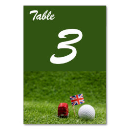 Golf bollar och Union Jack Flagga London England U Bordsnummer