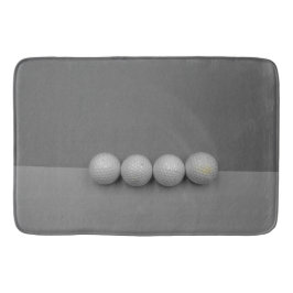 Golf-bollar på grått-bakgrund badrumsmatta