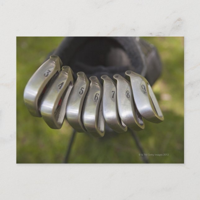 Golf-klubbar i en väska. Tre till nio Vykort (Framsida)