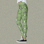 Golf klubbs mönster mjuk grönt<br><div class="desc">Roligt formade balar i en mjuk smickrande grönt färg för en skarp golfer. Det upprepande mönster är skapat med korsade golfklubbar och golfbollar,  med grönt som bakgrund.</div>