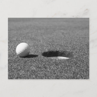Golfboll bredvid hål vykort