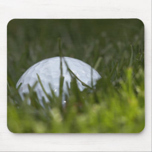 golfboll gömmer sig musmatta