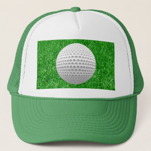 Golfboll & grönt keps