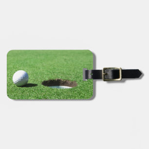 Golfboll och hål bagagebricka
