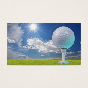 golfboll på en utslagsplats med gräs visitkort