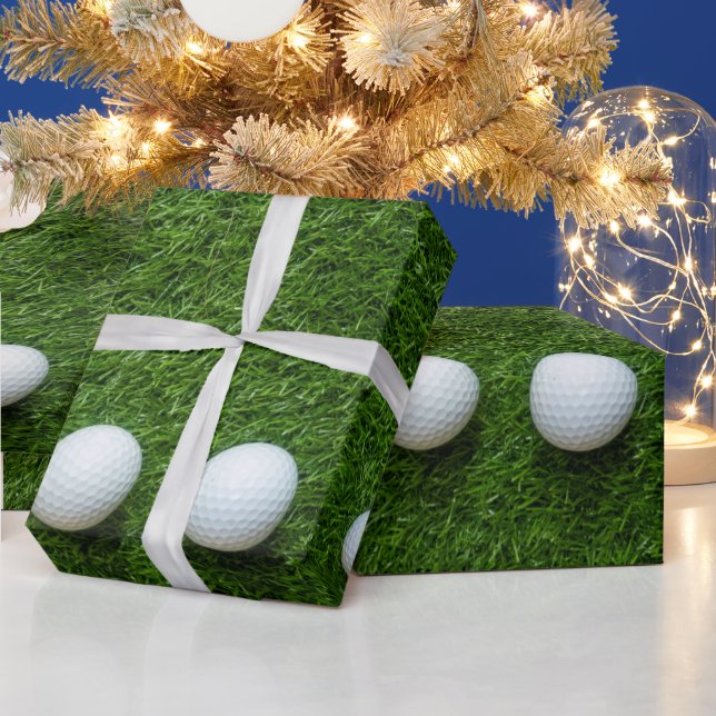 Golfboll på grön gräsmatta  presentpapper (Helgdagar)