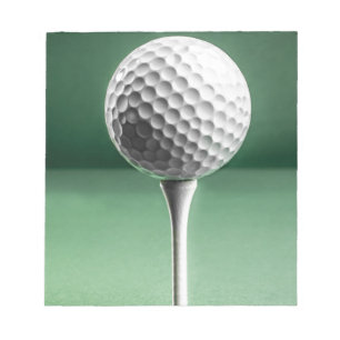 Golfboll på utslagsplats anteckningsblock