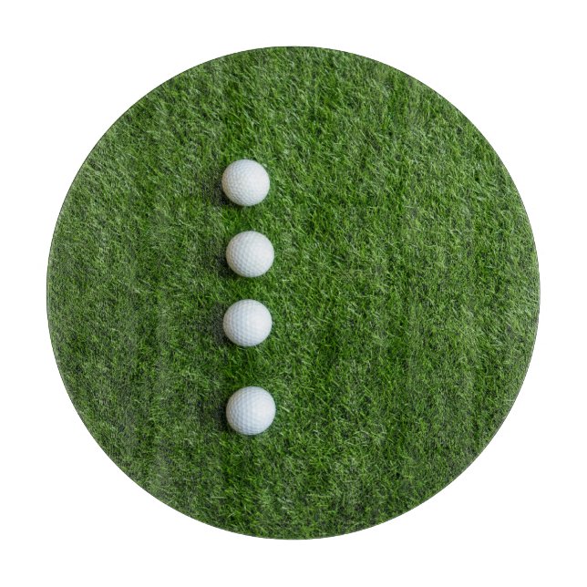 Golfbollar är på grönt gräs (Framsidan)