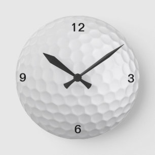 Golfbollen tar tid på rund klocka