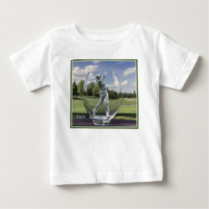 Golfspelare i en glastumlare med golfbana, t shirt