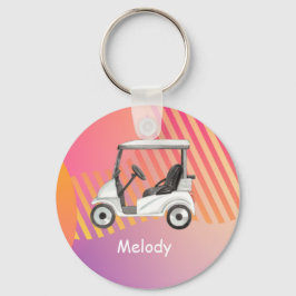 Golfvagn på rosa, färglös bakgrund med namn nyckelring