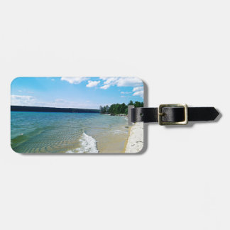 Gömd strand bagagebricka