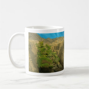 Gömt oasis kaffemugg