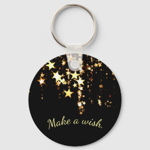 Gör en Wish på fallande guld- stjärnor på svart Nyckelring