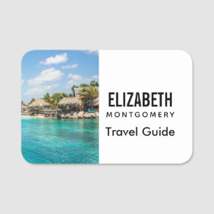 Gorgligt blått tropiskt block med tunna huts namnbricka