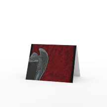 Gotisk ängel på rött sammetbrölloptack