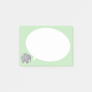 Grå elefant med pratbubbla på gräsgrön bakgrund post-it block