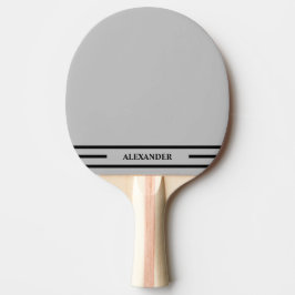 Grå och svart pingisracket med initialer