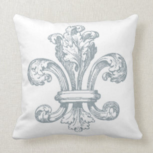 Gråa Fleur de Lis på vitdekorativ kudde