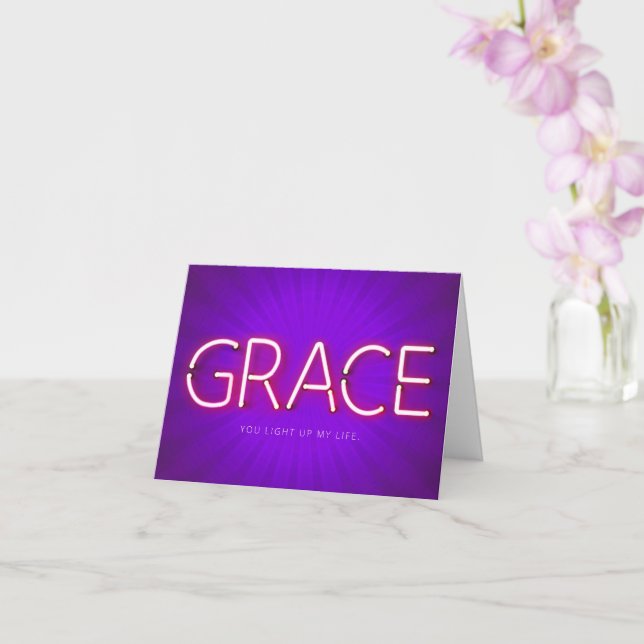 Grace namn i det ljusnande neon ljus-kortet kort (Orkide)