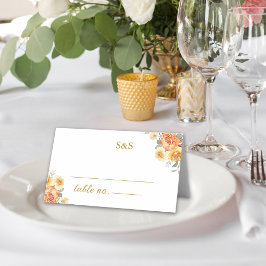 Graceful spring wedding adorned with orange flower placeringskort