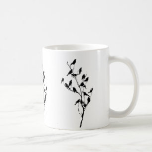Grackle skuggar kaffemugg