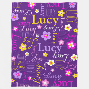Grafikblommor Lucy namn lila rosa gult Fleecefilt