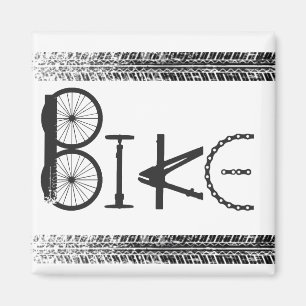 Grafitti från cykeldelar med däck spårar magnet