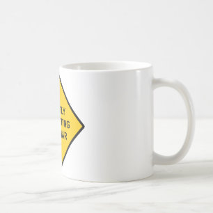 Grammatik korrigeras tyst kaffemugg