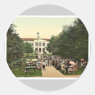 Grand Hotel och Kurgarten, Norderney, Tysklanda kl Runt Klistermärke