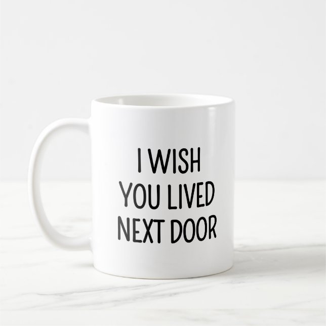Grannhuset vill att du bor nästa dörr kaffemugg (Vänster)