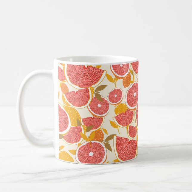 Grapefrukt och halverade segment med löv på vitt. kaffemugg (Vänster)