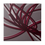 Grått & Burgundy Artistic Abstrakt Ribbon Kakelplatta<br><div class="desc">Grått- och burgnykeramiskt plattor har en konstnärlig abstrakt-ribbonsammansättning med skuggor av burgundy vin och grått med vita accenter på grått-bakgrund.</div>
