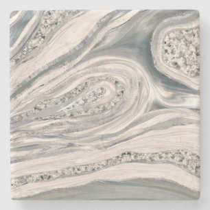 Grått, flytande marmor och kristaller - pärlor och stenunderlägg