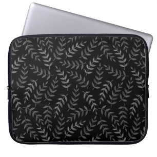 Grått löv mönster på svart laptop fodral