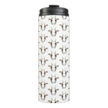 Grått och vita getter på tublerör