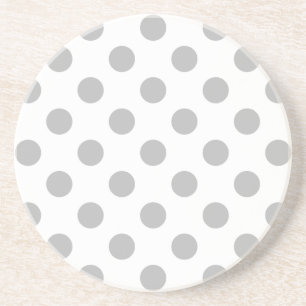 Grått polka dots på vitt underlägg sandsten