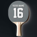 Grått Sports Jersey Team Jersey Pingisracket<br><div class="desc">Charcol Grått Team Jersey/Sports Jersey/Football Jersey Anpassa detta med ditt eget namn eller team namn och ett nummer. Du kan ändra textens storleka placering, färg och placering om du behöver göra ändringar, ta bort textskuggan, lägga till egen text och/eller bilder för att skapa din egen unika design med mera. FantabulousSports/Fantabulous...</div>