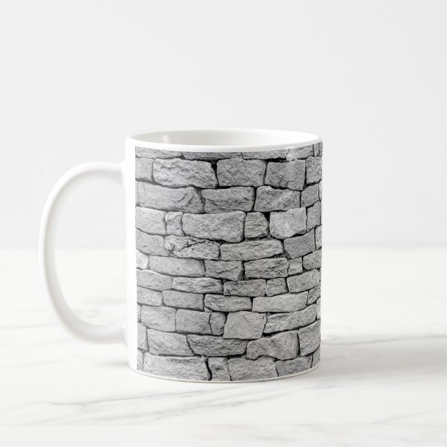 Grått-stenvägg, abstraktens bakgrund. kaffemugg (Vänster)