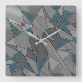 Grått-triangelskärningar med mörk blått delara gro fyrkantig klocka