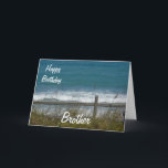 Grattis på födelsedagen Brother-Oceanen Vågar Kort<br><div class="desc">Det här är ett vackert kort för din broders födelsedag, med en bild av det blå havet vinkarare, som ses genom ett staket med strandgräs som viftar i vinden. Inuti är jag en trevlig vers som du naturligtvis kan anpassa till kostym och anpassa till dina behov! Du kan också göra...</div>
