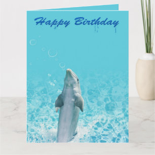 Grattis på födelsedagen-delfinen i Vatten Kort