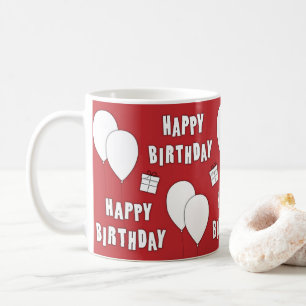 Grattis på födelsedagen med ballonger i röd bak kaffemugg