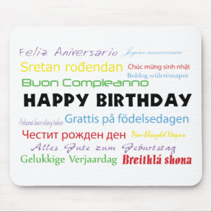 Grattis på födelsedagen på många språk är färgstar musmatta