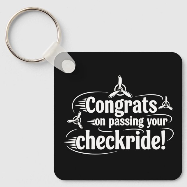 Grattis till din genomgångna checkflygning! nyckelring (Framsida)