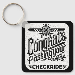Gratulerar när du kör kontrollen! nyckelring
